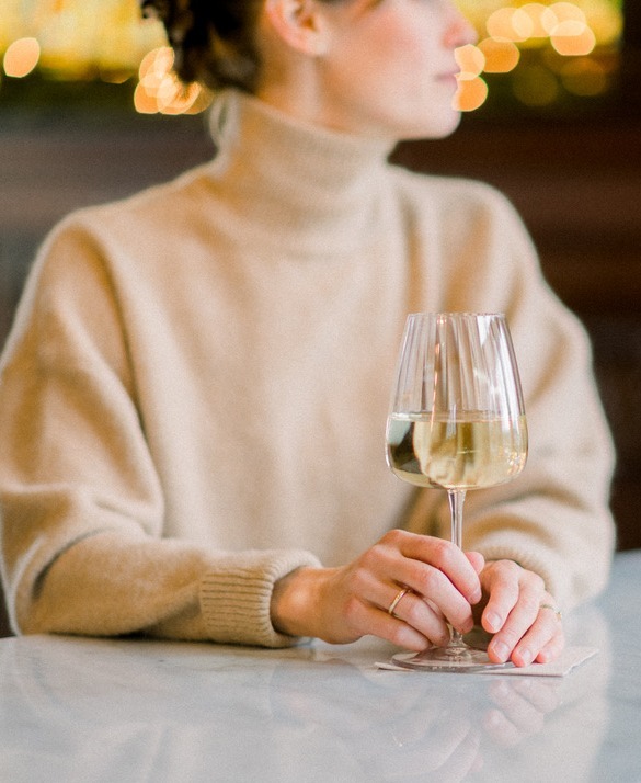 Guest with a glass of wine