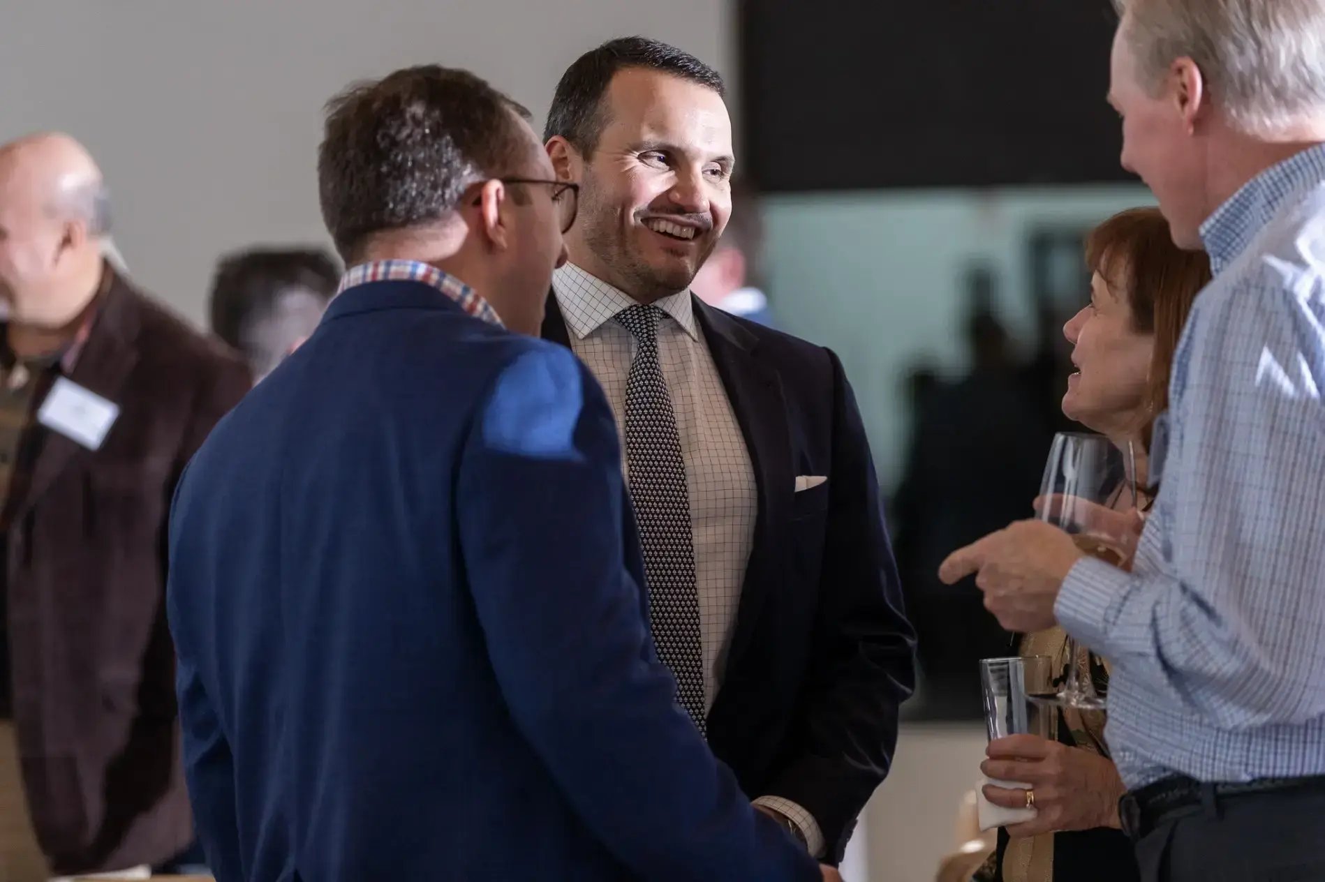 corporate guests talking