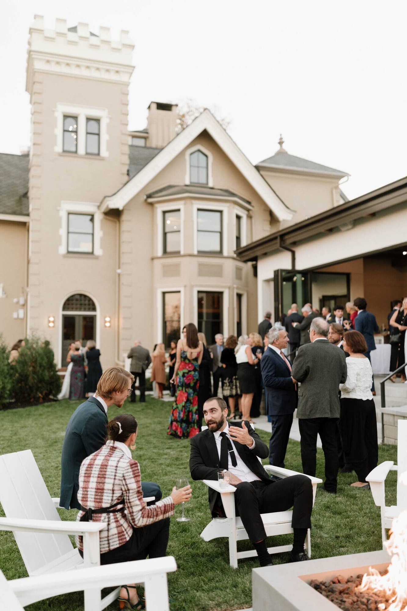 guests mingling at fire pit